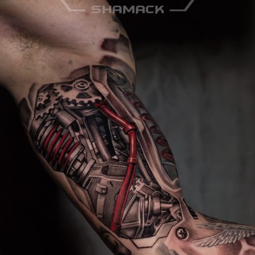 Biomechanical-realistic-3d-zbrush-biceps-arm-Black-and-grey-tattoo-Shamack-Inkden