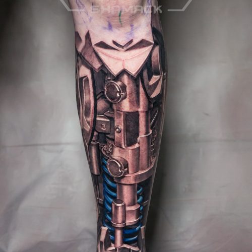 shin-spring-blue-shocker-biomechanical-3d-realism-Black-and-grey-tattoo-Shamack-Inkden