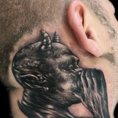 whisper-ear-devil-black-and-grey-chris-Strach-inkden-tattoo-Blackpool