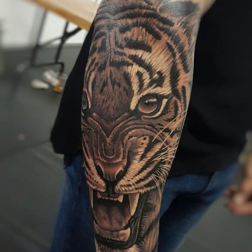 Tiger-angry-realistic-tattoo-by-Pedro-Vandiesel-at-Inkden-Tattoo-studio-in-Blackpool