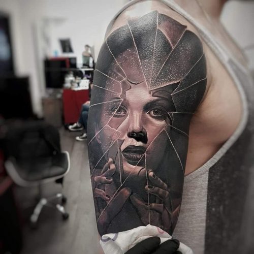 tattoo-of-Female-portrait-face-looking-throught-broken-glass-by-Pedro-VanDiesel-Tattoo_Inkden-Tattoo-Studio_Blackpool