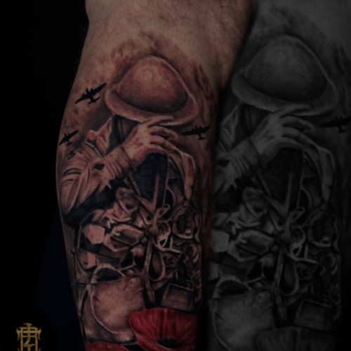Black-gray-realism-remembrance-soilder-poppy-red-colour-leg-tattoo-Blackpool-artist-Luke-Inkden